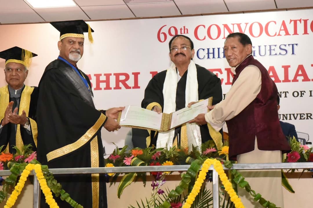 Receiving the Kala Ratna